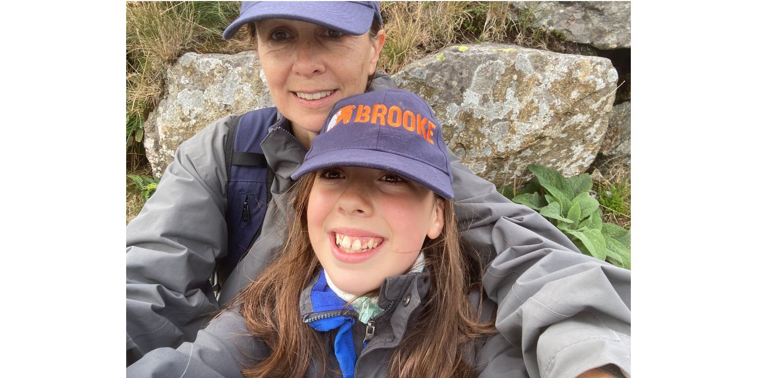 Selfie of young girl and mother trekking Snowdon 