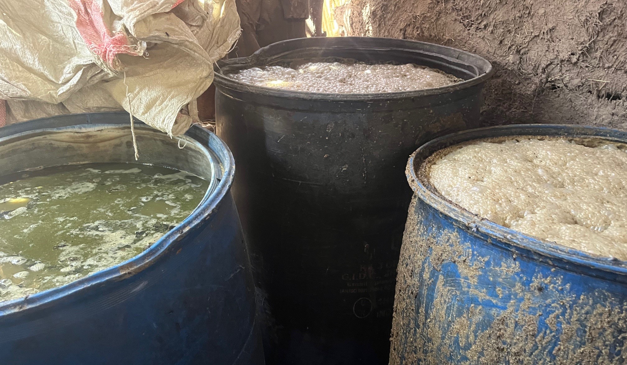 Buckets of alcohol fermenting in Ethiopia