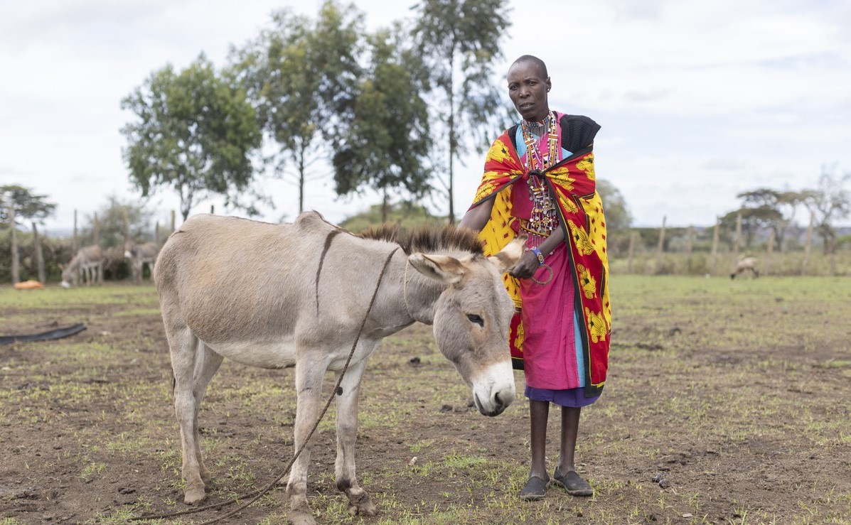 Woman with donkey in Kenya