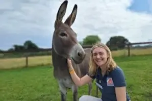 Phoebe from the Brooke legacy team with a donkey