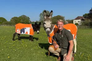 Dr Scott Miller with donkeys 