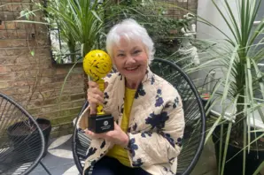 Annette Badland with charity's film award trophy