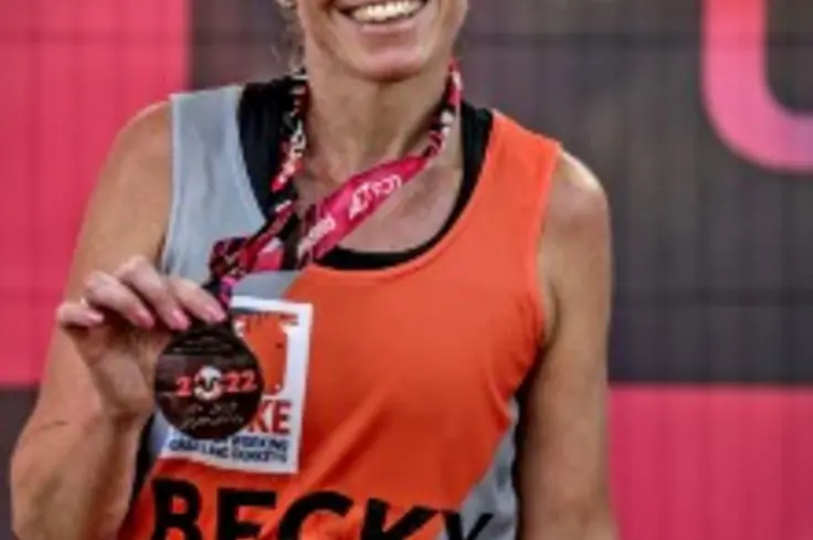 Rebecca with her medal from the 2022 London Marathon. 