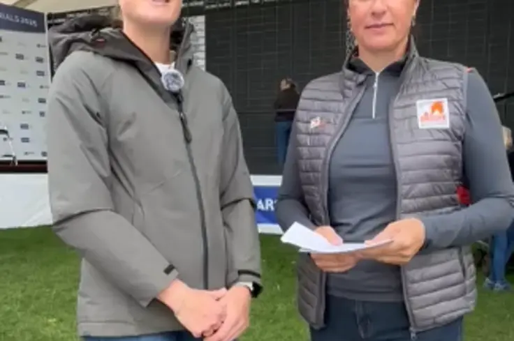 Eventer Caroline Harris with Brooke representative at Badminton Horse Trials 2025.