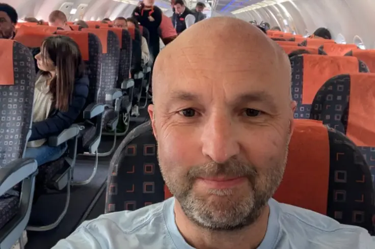 Brooke CEO, Chris Wainwright, on the plane to an event in Paris, 2025. 