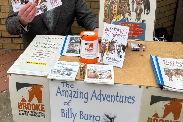 Gregory Harris at his market stand selling books for charity in Saltburn-by-the-Sea